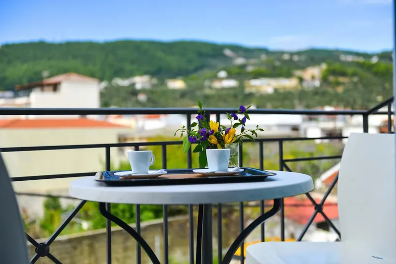 Breakfast on a balcony over the town