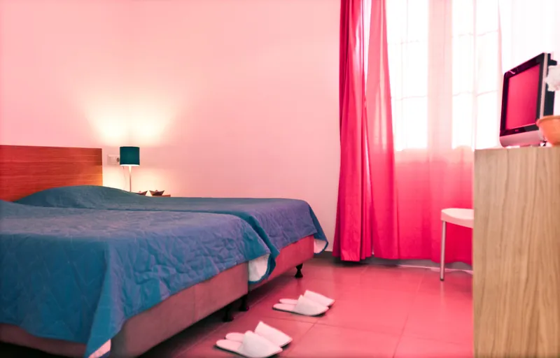 The Economy Room with its pink wall