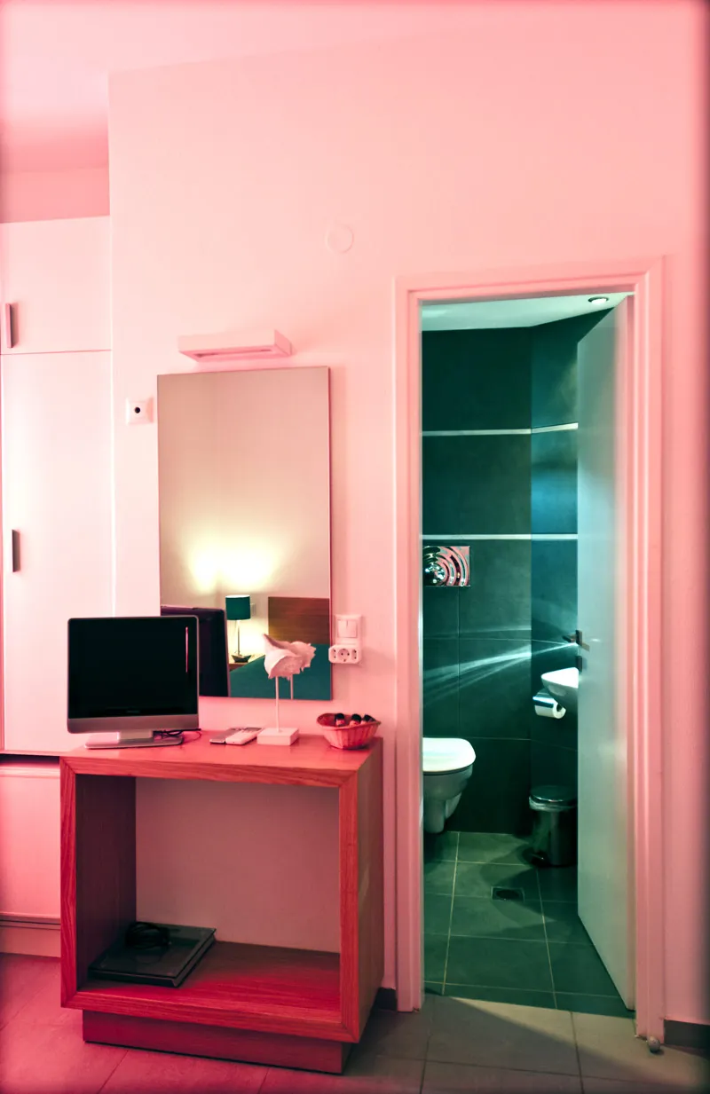The Economy Room desk and TV