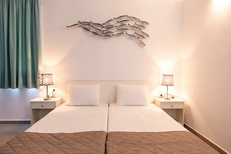 A Family Apartment bedroom with twin beds