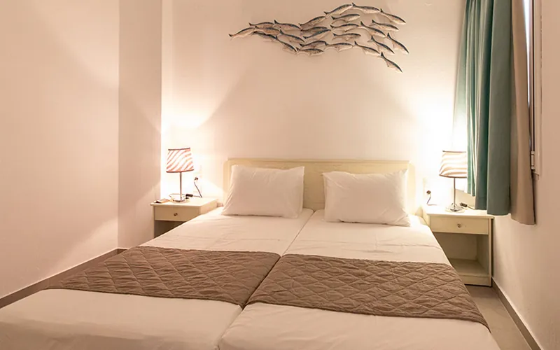 Twin beds in the Triple Apartment